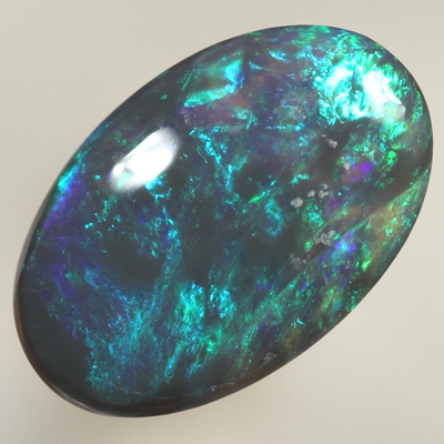SOLID BLACK OPAL Bright green and turquoise colours SEE VIDEO